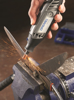 Afbeeldingen van DREMEL SLIJPSTEEN ALUMINIUMOXIDE KEGELVORM 6,4MM (953)